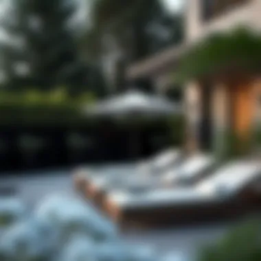 Modern Outdoor Space Featuring Chaise Lounges and Umbrella Modern outdoor space featuring chaise lounges and umbrella