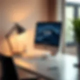 Sleek small computer desk with iMac setup