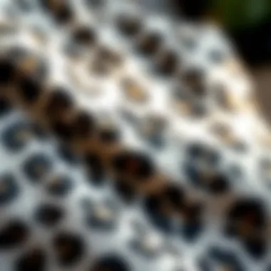 Close-up of Gray Leopard Print Fabric Texture Close-up of gray leopard print fabric texture