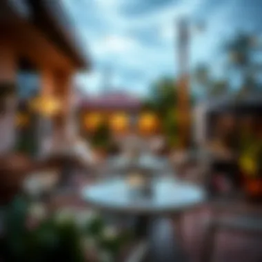 Cozy Outdoor Space with High Top Tables Cozy outdoor space featuring small high top tables and decor