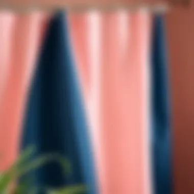 Close-up of navy and blush color palette on a shower curtain