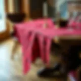 Elegant red buffalo plaid table cloth draped on a rustic wooden table